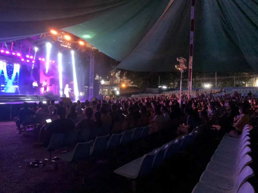 Outdoor live show with a large crowd